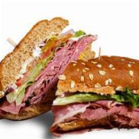 7. The Larry King (Pastrami) · Sweet Roll, Lettuce, Tomato, Onions, Pickles, Pepperoncini, Mayo & Mustard.