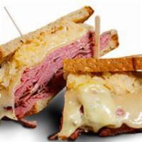 10. Ruby's Reuben (Reuben) · Toasted Sliced Rye, Corn Beef, Thousand Island, Lettuce, Tomato, Onions, Pickles, Pepperonci...