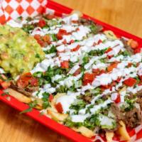 Nacho Fries · French Fries topped with Cheese, Sour Cream, Guacamole, Pico de Gallo and  Choice of Meat