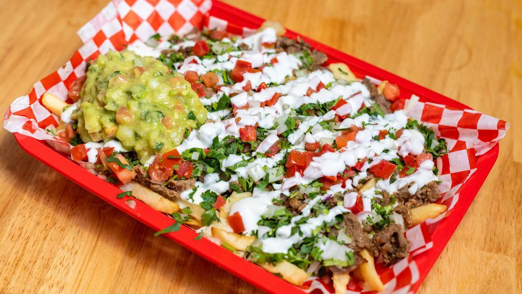 Nacho Fries · French Fries topped with Cheese, Sour Cream, Guacamole, Pico de Gallo and  Choice of Meat