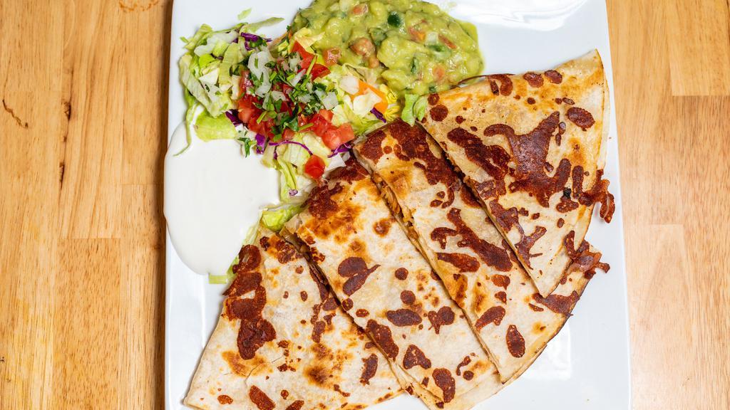 Simple Quesadilla · Large Flour Tortilla With Cheese Cut in 3 Pieces.