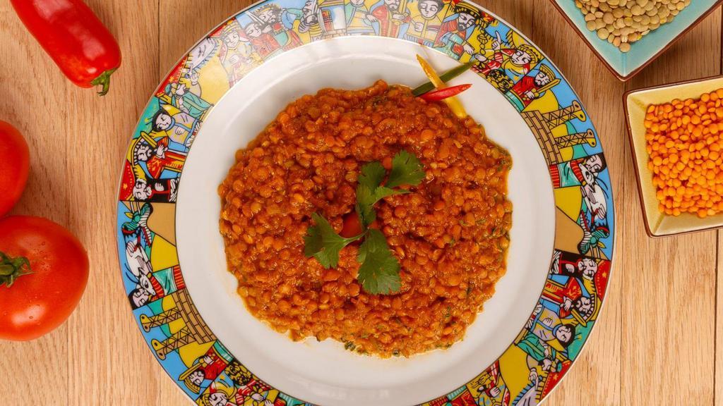 A Lentil Bit of Heaven (Red Lentils) · Authentic spicy red lentils cooked with native Ethiopian spices and oven cooked chili paste. Served with Injera or Turmeric Rice.