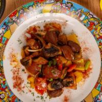 Mush(room) of a good thing (Tibs) · Fresh seasonal mushrooms sautéed with blend of native Ethiopian spices, onions, tomatoes, ga...