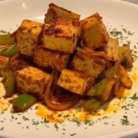 Tofu Tibs · Fresh seasonal tofu stir-fried in a blend of native Ethiopian spices and sautéed with onions...