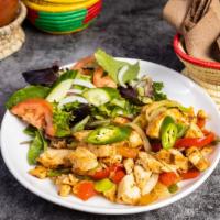 Chicken Tibs · Chicken breasts marinated in native Ethiopian spices . Consequently, it is stir with fried o...