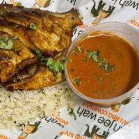 Wild Caught Pompano Full Fish Fry · Served with coconut curry and rice.