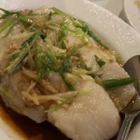 Steamed Fish Fillet with Ginger and Scallions · Fish fillet, scallions, ginger, soy sauce and sake.