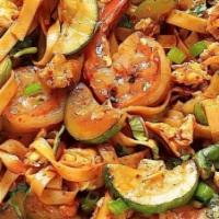 Sriracha Zucchini Pasta · Spiralized Zucchini Noodles seasoned with sea salt, black pepper, fine paprika, turmeric and...