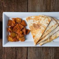 Cheese Quesadilla · Melted cheese in light and soft wrap bread. Comes with pita chips and juice.