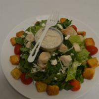 Chicken Caesar Salad · Grilled chicken, romaine lettuce, Parmesan cheese, feta cheese, grape tomatoes, croutons.