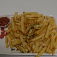 Garlic Fries · Served with side of ketchup.