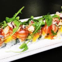 Flamango roll · Cucumber, avocado wrapped with mango & salmon , topped with octopus salad ,tobiko and scallion