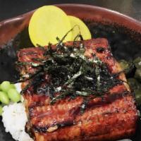 Unagi Don · BBQ Eel over rice with house special dressing ,with sides.
(this item comes miso soup)
