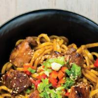 Garlic Noodles With Chicken · Thick Japanese noodles stir-fried with chicken, sliced garlic, butter, and soy sauce. Topped...