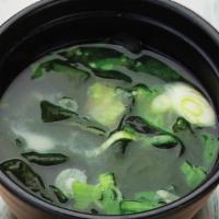 Miso Soup · A comforting cup of our classic miso soup with seaweed, tofu, and chopped green onions.