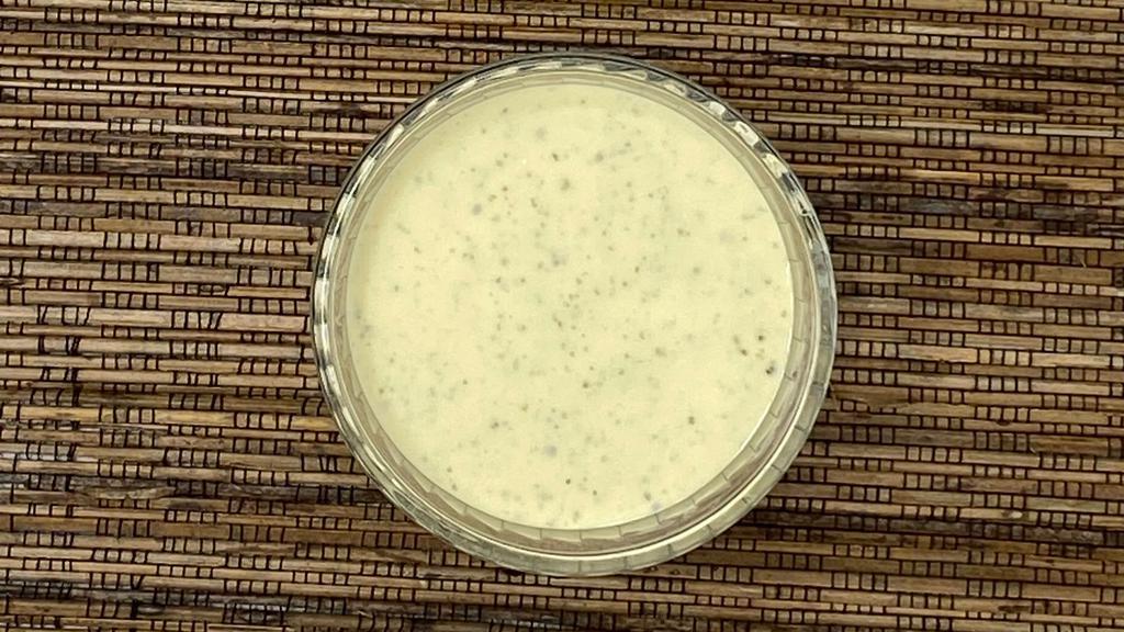 Yuzu Aioli Sauce · Our housemixed sauce features Japanese mayo and yuzu citrus sauce. Photo is meant for image purposes only and does not necessarily depict the amount of sauce that will be provided.