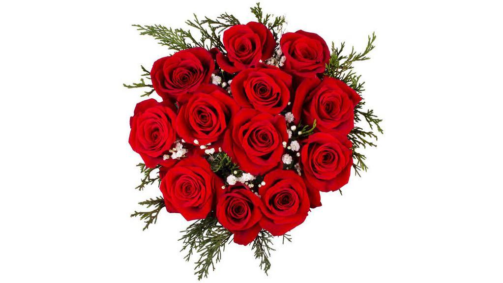 Premium Red Rose Bouquet (12Ct) · Radiant. Timeless. Romantic. There’s something so special about this dozen of red roses, especially the way they’ll make a loved one feel when these beautiful blooms arrive at their door. Bouquet is a stunning dozen of red roses picked fresh and are cared for every step of the way and hand delivered fresh to ensure lasting beauty and enjoyment. This bouquet includes 12 Red Roses, accented with assorted greenery. Bouquets are sold as described, no customizations (Actual product might have slight difference in recipe than shown in image)