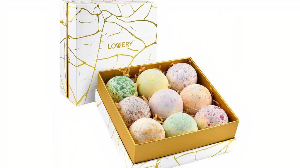 Variety Scent Bath Bomb (9 Pcs) · Your Bath Bomb Gift Set contains 9 Premium Bath Bombs individually wrapped in Gold Glitter Marbleized Colors. It comes in 9 unique fragrances including Vanilla Coconut, Lavender, Jasmine, Tea Tree, Lemon Basil, Cherry Blossom, Orange, Magnolia and Honey Almond.