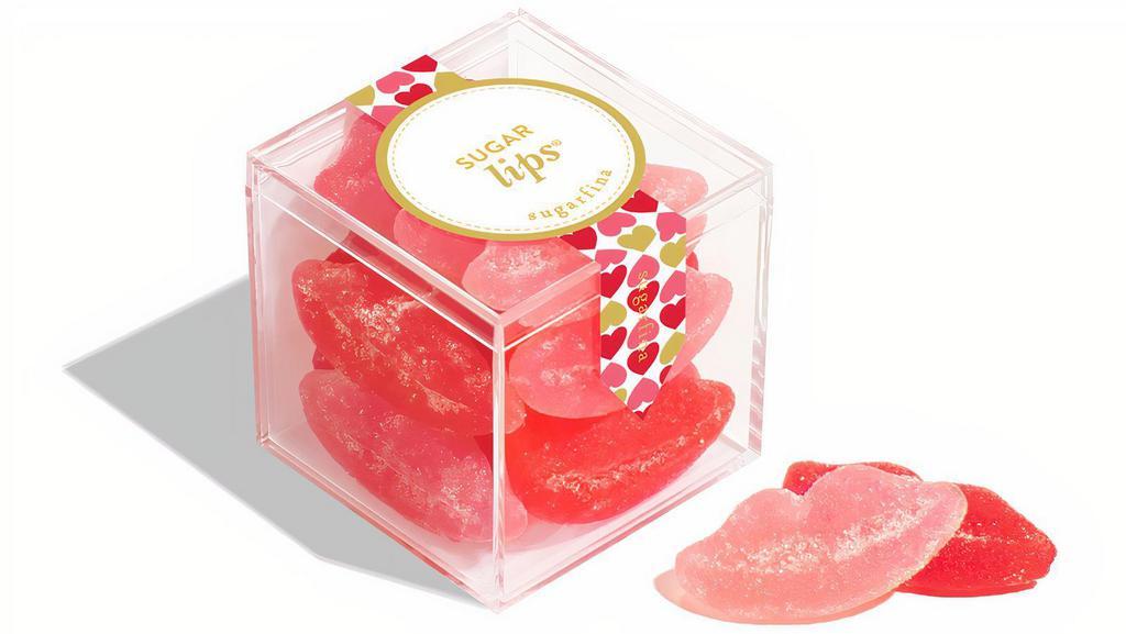 Candy Cube-Sugar Lips Cube By Sugarfina · Hey sugar lips, pucker up to these sweet and sour gummy lips in mouthwatering flavors of strawberry, cherry and watermelon.

Kissably-soft and chewy, these sugar lips are dusted in sweet & sour sugar crystals for a lip-smackin' mouthwatering smooch sensation.

These sour gummies are gelatin-free—perfect for vegans and vegetarians. Taste for yourself why Sugar Lips are one of our best selling candies!