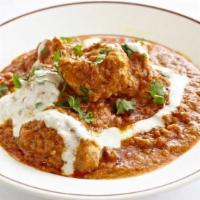 Chicken Tikka Masala · Marinated boneless chicken breast pieces cooked in tandoor oven and then simmered in a thick...