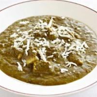 Saag Paneer · Pureed spinach and cubes of paneer cheese cooked with spices.