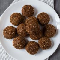 Falafel (Dozen) · Seasoned ground garbanzo balls fried to golden brown.