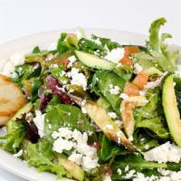 Mediterranean Salad · Vegetarian. Mixed greens, grilled zucchini and peppers, tomatoes, and feta.