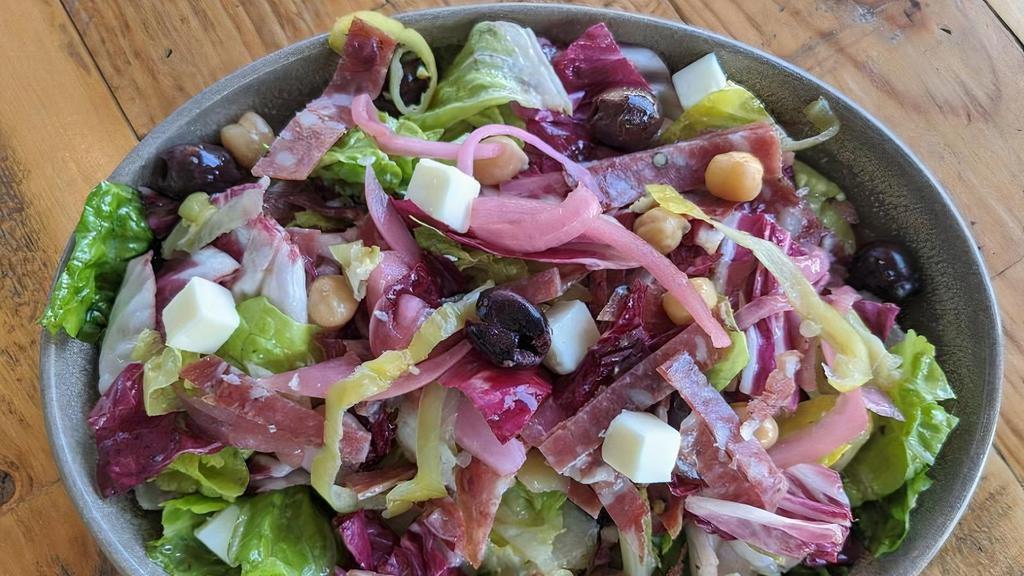 Chopped Salad · radicchio, romaine, olives, pickled onions, provolone, pepperoncini, salumi, chickpeas, red wine vinaigrette *dressing served on side*
