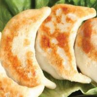 #1.4. Pot Stickers (8 Pieces) · Soy protein, ginger, mushroom and chives.
