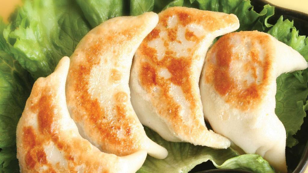 #1.4. Pot Stickers (8 Pieces) · Soy protein, ginger, mushroom and chives.