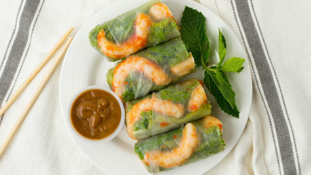 #1.2. Saigon Rolls · Gluten-free, contain nuts. Lettuce, rice noodle, yam crescents & herbs rolled in fresh rice paper, served with a peanut dipping sauce.