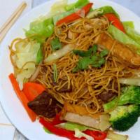 #7.8. Chow Mein · Contains nuts. Wheat noodles stir-fried with tofu, bean sprout, celery, carrots, cabbage and...