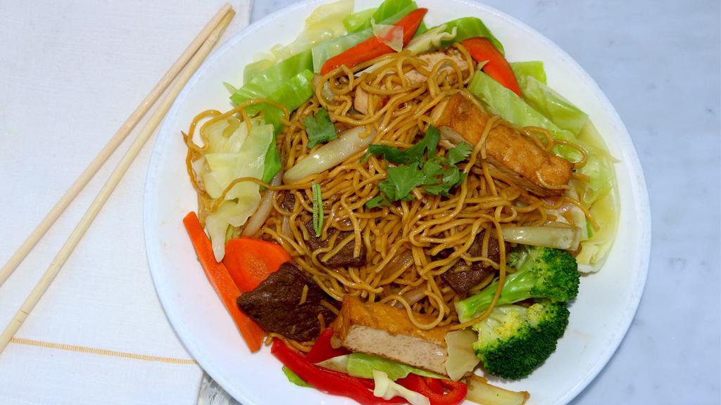 #7.8. Chow Mein · Contains nuts. Wheat noodles stir-fried with tofu, bean sprout, celery, carrots, cabbage and snow peas.