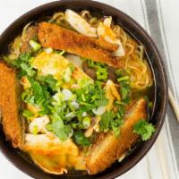 #7.7. Katsu Miso Ramen · Wheat noodle soup with vegan katsu, seaweed, sprouts, mushroom, bamboo shoots, green onion, ...