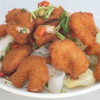E8. Spicy Cha Cha · Yam flour crescent crumbed and wok-fried with spices, bell pepper, celery and chili.