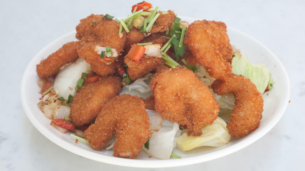 E8. Spicy Cha Cha · Yam flour crescent crumbed and wok-fried with spices, bell pepper, celery and chili.