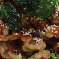 Crispy Mushroom · Organic oyster mushroom, topped with basil, sesame and delicate sweet and sour sauce.