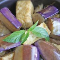 #8.4. Tofu Eggplant · Spicy. Tofu, eggplant, cilantro, peas & carrot stir fried in szechuan sauce.