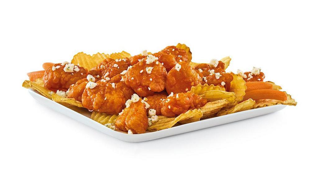 Boneless Wings · All-white meat boneless wings with your choice of sauce, served on a bed of Yukon kettle chips.