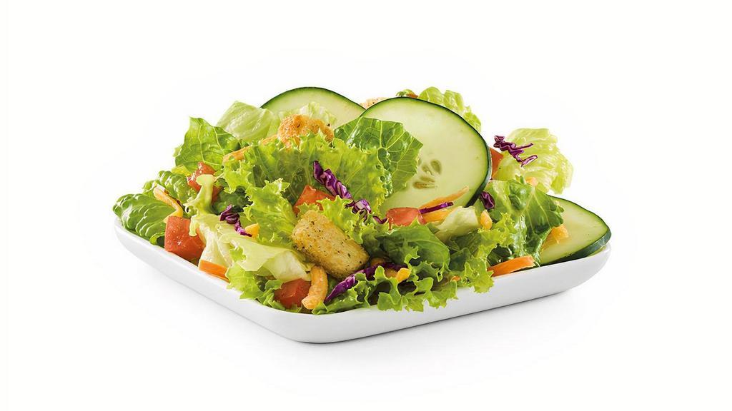 Side House Salad · Diced tomato, sliced cucumber, shredded Cheddar cheese and croutons on mixed greens with choice of dressing.. Does not include calories for dressing.