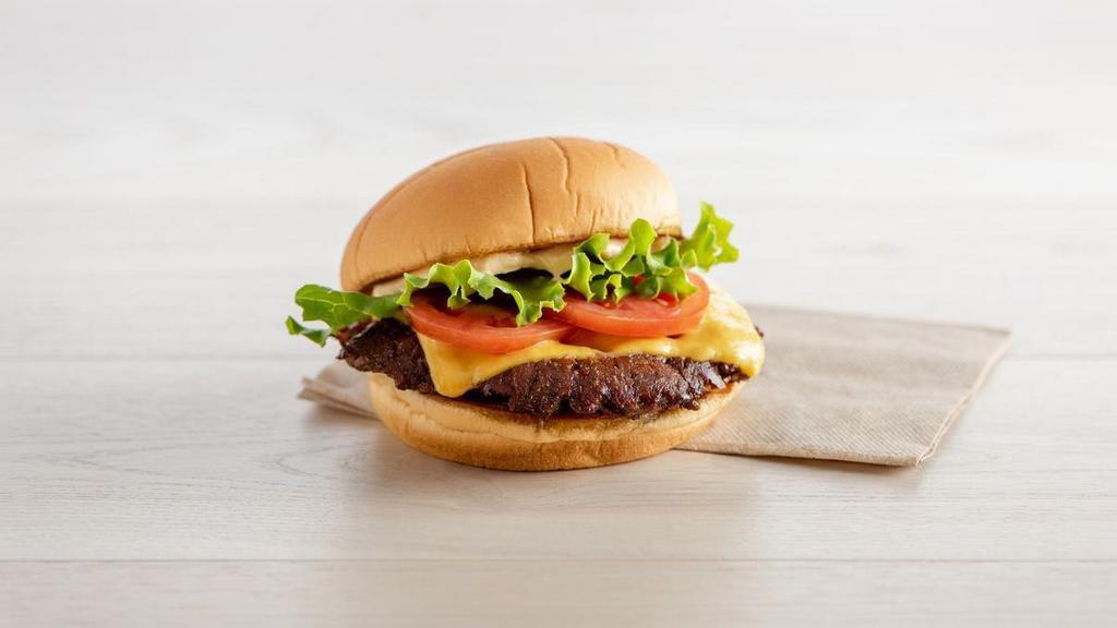 Shackburger · Cheeseburger with lettuce, tomato, ShackSauce (contains eggs, milk, soy, wheat, and gluten)