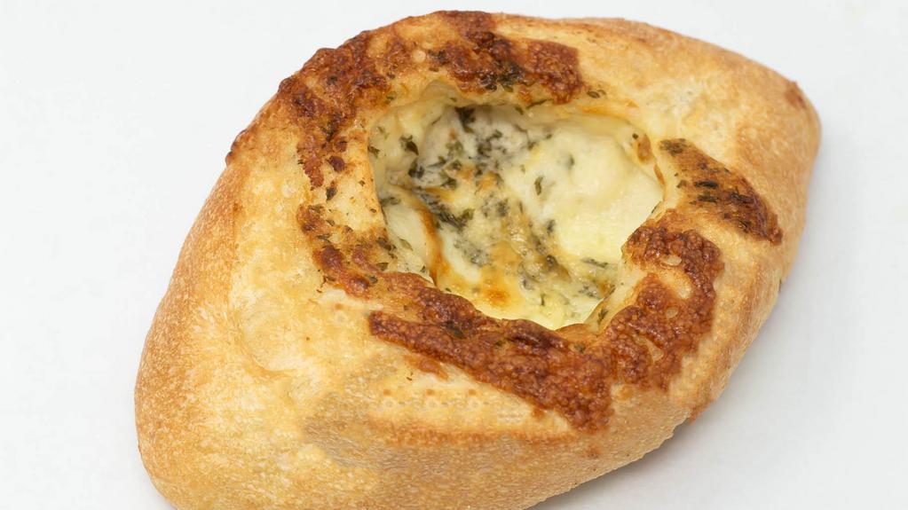 Int'l Cheese Bread · Crisp French Loaf Rolled with Gruyere, Fontinella, & Provolone Cheese.