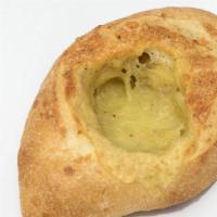 Garlic Cheese Bread · Crisp French Loaf Filled with Sonoma Garlic Jack Cheese.