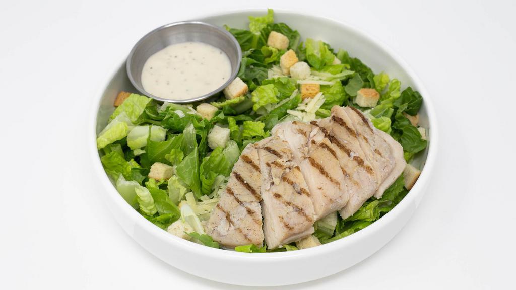 Grilled Chicken Caesar Salad  · Grilled chicken breast, crisp romaine lettuce, parmesan cheese, crouton served with Caesar dressing.