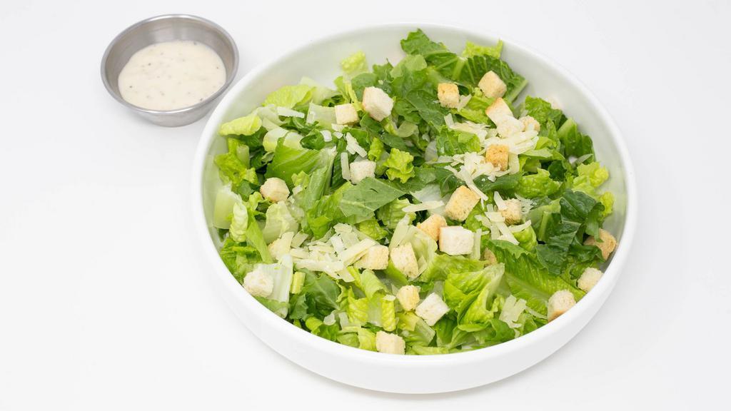 Half Caesar Salad · Crisp romaine lettuce, parmesan cheese, crouton served with Caesar dressing