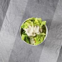 Caesar Salad · Romaine lettuce, croutons, lemon, and homemade caesar dressing.