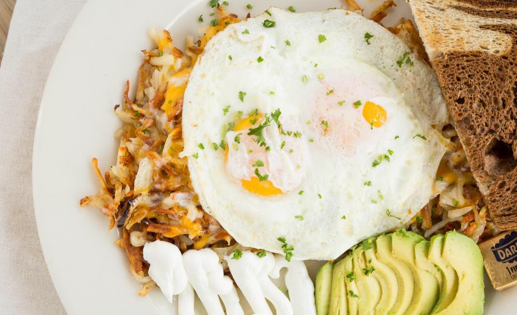 2. Hashtag · Fresh hash browns scrambled with grilled onions, melted jack and cheddar cheese, avocado and sour cream, two eggs any any style and toast.
