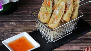Crispy Rolls · Vegetarian egg rolls filled with clear noodles, taro, carrots and cabbage, served with a swe...
