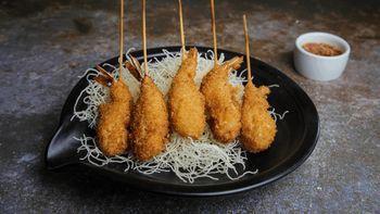 Coconut Prawns · Deep fries prawns skewers dipped in flour and coconut flake, served with sweet and sour sauc...