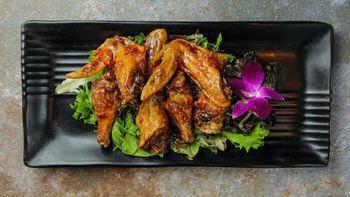 Angel Lava · Deep-Fried chicken wing sauteed with sweet and spicy sauce topped with crispy basil.